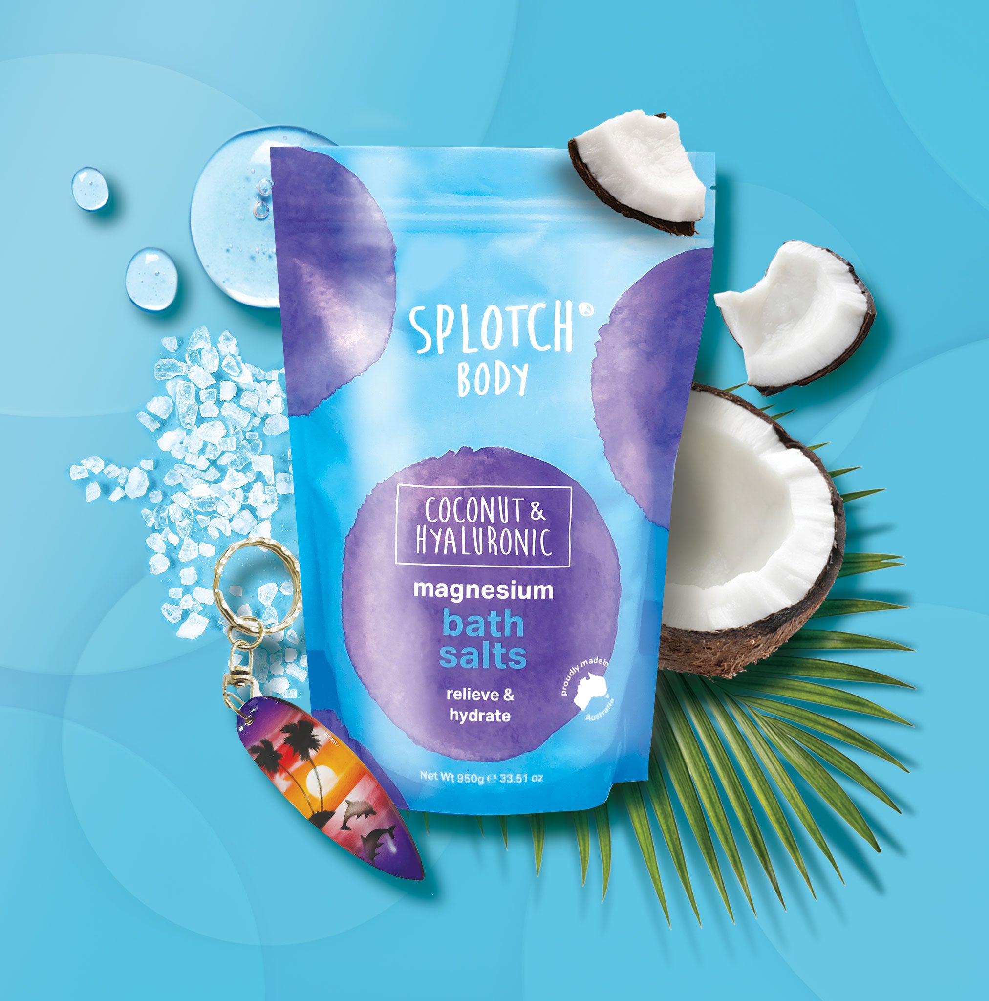 Splotch Body Coconuts & Hyaluronic Magnesium Bath Salts packaging on a blue background with coconuts and palm leaves.